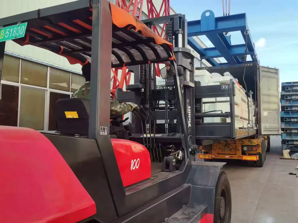Steel cargo loaded into shipping containers at port